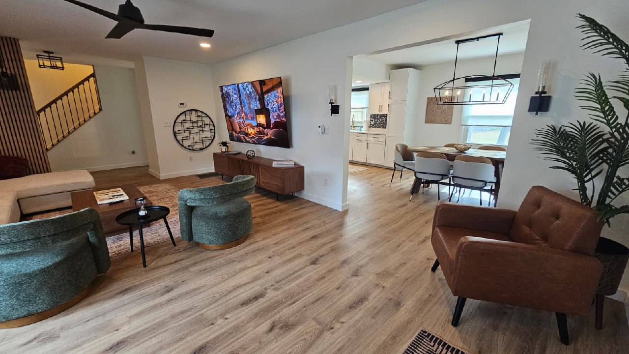 Living room open to dining and kitchen